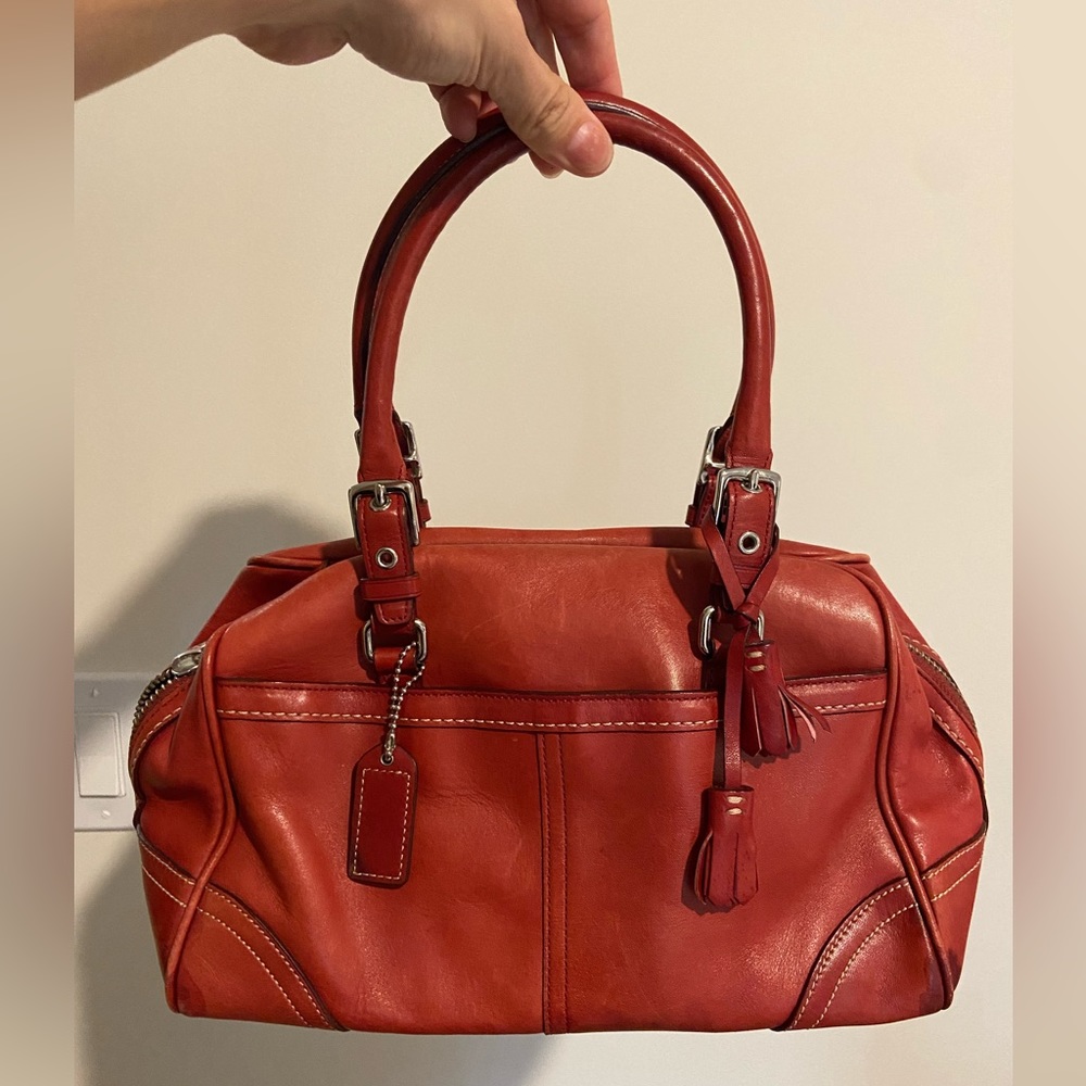 Coach sun satchel bag in beautiful red/burgundy color.